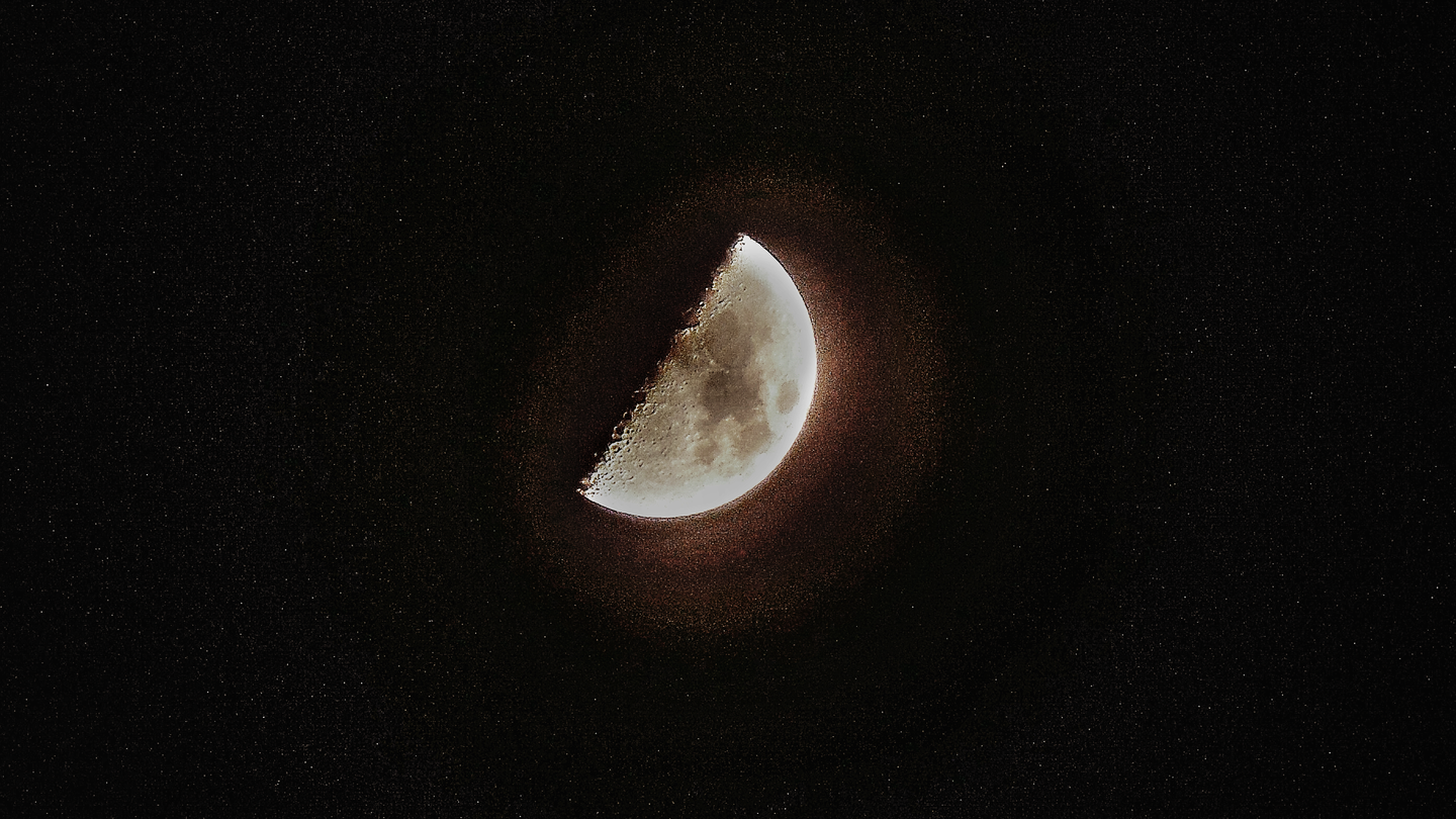 Image of the moon surrounded by haze